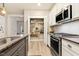 Well-organized pantry with shelving, offering ample storage space at 1501 Millrock Trl, Wendell, NC 27591