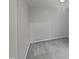 An empty bedroom features gray carpeting and white trim at 1599 Rogers Pointe Ln, Creedmoor, NC 27522