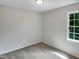 Neutral bedroom with a window and carpet at 1599 Rogers Pointe Ln, Creedmoor, NC 27522