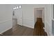 Dining room with hardwood floors and modern lighting fixture at 1599 Rogers Pointe Ln, Creedmoor, NC 27522