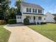 Charming two-story home with landscaped yard and driveway at 1599 Rogers Pointe Ln, Creedmoor, NC 27522