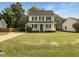 Charming two-story home with classic curb appeal and a well-maintained front yard at 1599 Rogers Pointe Ln, Creedmoor, NC 27522