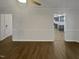 Open floor plan living room with hardwood flooring and views of the kitchen at 1599 Rogers Pointe Ln, Creedmoor, NC 27522