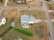 Aerial view of home showing backyard, patio, and surrounding suburban neighborhood at 177 Clarence Ln, Garner, NC 27529