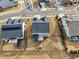 Aerial view of a residential neighborhood highlighting the property's location and surrounding houses at 1829 Knights Crest Way, Wake Forest, NC 27587