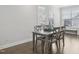 Eat in dining area with a modern table setting and bench seat at 1829 Knights Crest Way, Wake Forest, NC 27587