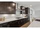 Gourmet kitchen with stainless steel appliances and herringbone backsplash at 1829 Knights Crest Way, Wake Forest, NC 27587