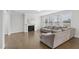 Bright living room features hardwood floors, a fireplace and large windows at 1829 Knights Crest Way, Wake Forest, NC 27587