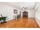 Spacious living room boasting hardwood floors and ample natural light from a bright window at 2005 Sutphin Dr, Sanford, NC 27330