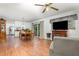 Open floor plan showcasing the living room with fireplace and dining area adjacent to the kitchen at 2005 Sutphin Dr, Sanford, NC 27330