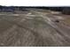 Expansive aerial view of a lot with trees and open spaces, perfect for building a dream home or a business at 2113 Nc 55, Coats, NC 27521