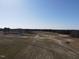 Wide aerial panorama of rolling fields and distant house, perfect for rural living and investment at 2113 Nc 55, Coats, NC 27521