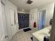 Bathroom featuring dual closets, vanity with sink, and shower with blue paisley shower curtain at 2113 Nc 55, Coats, NC 27521