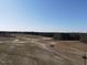 Expansive land featuring open fields and wooded areas, ideal for development at 2113 Nc 55, Coats, NC 27521
