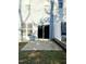 View of the backyard with a concrete patio, grill, and wood fence at 2114 Stoney Spring Dr, Raleigh, NC 27610