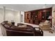 Finished basement with custom built-in shelving, cabinets and media equipment at 216 Copper Beech Ct, Chapel Hill, NC 27517