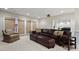 Finished basement with cozy seating area and adjacent room with a pool table at 216 Copper Beech Ct, Chapel Hill, NC 27517