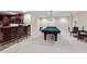 Basement boasting a bar and billiards area for entertainment at 216 Copper Beech Ct, Chapel Hill, NC 27517