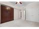Neutral bedroom features murphy bed and ample closet space at 216 Copper Beech Ct, Chapel Hill, NC 27517