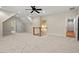Spacious bonus room with neutral carpet, ceiling fan, and doorway to hallway at 216 Copper Beech Ct, Chapel Hill, NC 27517