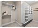 Spacious walk-in closet with custom shelving and ample storage for clothes and accessories at 216 Copper Beech Ct, Chapel Hill, NC 27517