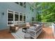 Large deck offers outdoor seating and beautiful backyard views at 216 Copper Beech Ct, Chapel Hill, NC 27517