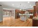 Spacious kitchen features an island, granite countertops, and modern appliances at 216 Copper Beech Ct, Chapel Hill, NC 27517