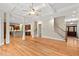 Spacious living room with open layout, hardwood floors, and coffered ceilings; perfect for entertaining at 216 Copper Beech Ct, Chapel Hill, NC 27517