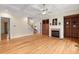 Inviting living room featuring a fireplace, hardwood floors, and coffered ceilings; perfect for Gathering gatherings at 216 Copper Beech Ct, Chapel Hill, NC 27517