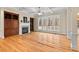 Bright living room with fireplace, large windows, and built-in cabinets creates a warm and inviting atmosphere at 216 Copper Beech Ct, Chapel Hill, NC 27517