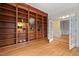 Office with custom built-in bookshelves offers ample storage and a sophisticated workspace at 216 Copper Beech Ct, Chapel Hill, NC 27517