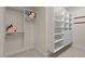 Walk-in closet with custom shelving, designed to maximize storage and keep belongings organized at 216 Copper Beech Ct, Chapel Hill, NC 27517
