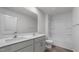 Bright bathroom with double sinks, modern fixtures, and a shower-tub combination at 258 Palm Dr, Sanford, NC 27332