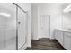 Modern bathroom features a glass-enclosed shower and stylish vanity at 260 Logan Creek Dr, Zebulon, NC 27597