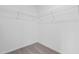 Spacious walk-in closet with carpet flooring and wire shelving for organized storage at 260 Logan Creek Dr, Zebulon, NC 27597