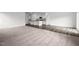 Spacious open floor plan from living room into modern kitchen at 260 Logan Creek Dr, Zebulon, NC 27597