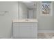 Bathroom featuring a vanity with storage and a large mirror at 28 W Madison, Pittsboro, NC 27312