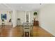 Dining room featuring hardwood floors and plenty of natural light at 28 W Madison, Pittsboro, NC 27312