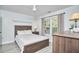 Bright bedroom with a full bed, neutral decor, and natural light from the window at 407 Crickentree Dr, Cary, NC 27518