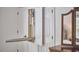 A closet with a built-in ironing board and additional shelving and storage at 407 Crickentree Dr, Cary, NC 27518