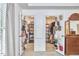 Walk-in closets with shelving, hanging racks, storage, and shoe storage in a tidy design at 407 Crickentree Dr, Cary, NC 27518