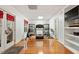 Bright home gym with hardwood floors, exercise equipment, and plenty of natural light at 407 Crickentree Dr, Cary, NC 27518