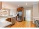 Spacious kitchen with stainless steel appliances and a convenient pass-through to dining area at 4325 New Hope Springs Dr, Hillsborough, NC 27278