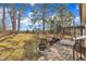 Backyard features a patio area with outdoor furniture and a spacious lawn, perfect for outdoor activities at 505 Wild Goose Ln, Creedmoor, NC 27522