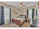 Comfortable bedroom featuring a ceiling fan and a coordinated decor scheme for a relaxing atmosphere at 505 Wild Goose Ln, Creedmoor, NC 27522