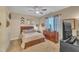 Cozy bedroom featuring a ceiling fan, and a wooden dresser with decorative accents at 505 Wild Goose Ln, Creedmoor, NC 27522