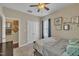 Bedroom view featuring a ceiling fan and a wardrobe, creating a comfortable and restful space at 505 Wild Goose Ln, Creedmoor, NC 27522
