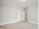Spacious bedroom featuring neutral walls and plush carpeting at 512 S Mebane St, Burlington, NC 27215