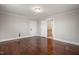 Hardwood flooring and natural light enhance this inviting bedroom space at 512 S Mebane St, Burlington, NC 27215