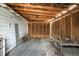 Spacious shed interior features exposed wood framework and a concrete floor at 512 S Mebane St, Burlington, NC 27215